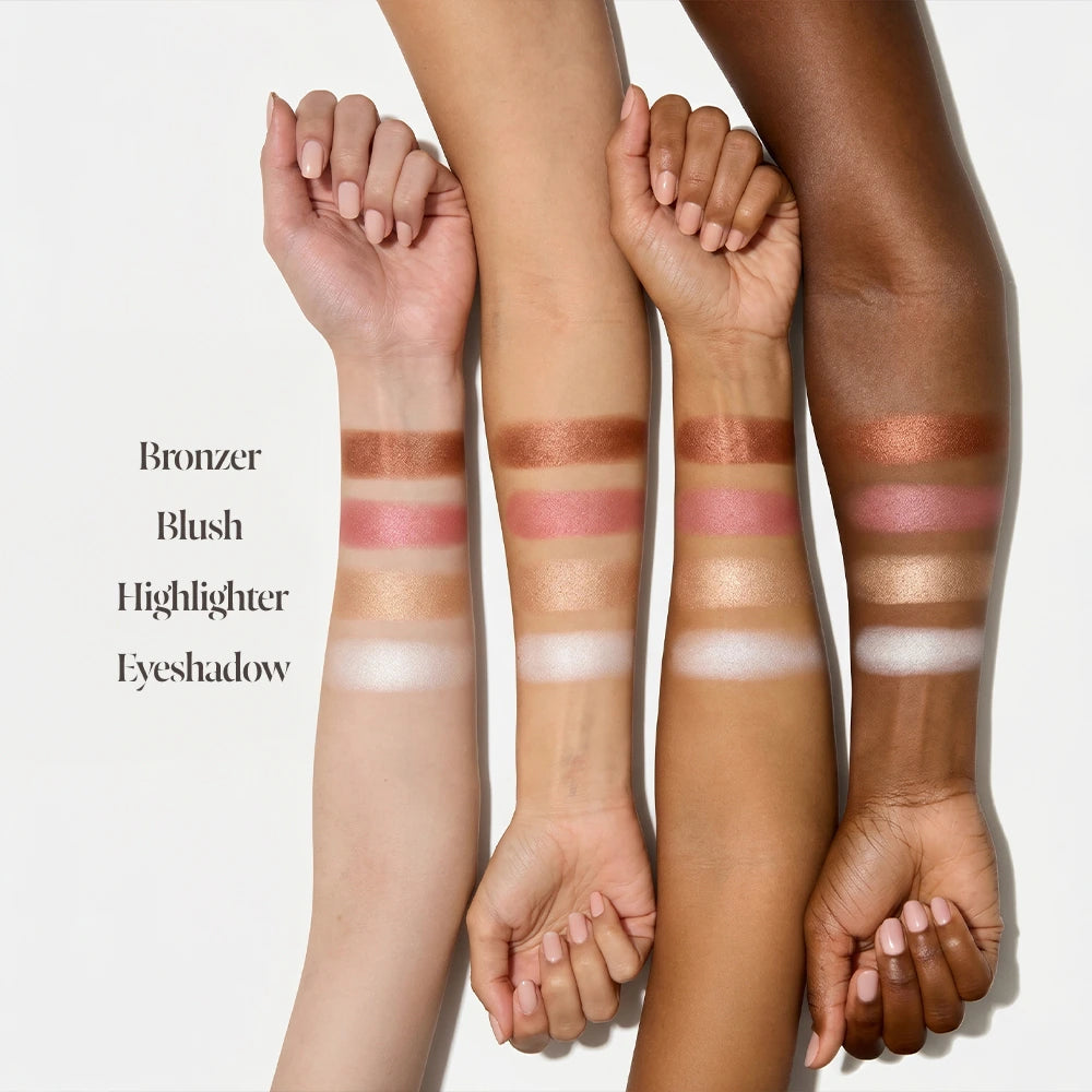 Three arms with makeup swatches labeled 'Bronzer', 'Blush', 'Highlighter', and 'Eyeshadow' on a white background.